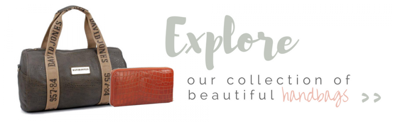 Explore designer leather handbags and purses